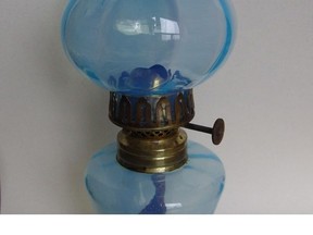 Small but impressive this blown art glass miniature kerosene oil lamp was originally advertised as a 'night lamp.'  Few have survived and it is quite rare today.