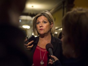 Ontario NDP Leader Andrea Horwath speaks to reporters at Queen's Park, in Toronto on Monday, Sept. 24, 2018.