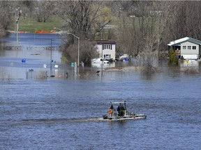 Homes along the Ottawa River in Gatineau on Tuesday, April 30, 2019.