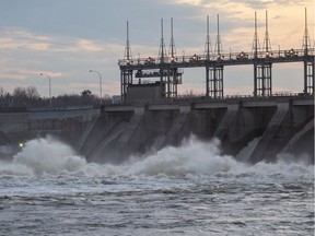 Water rushes through the Carillon Hydro electric dam on Thursday, April 25, 2019 in Carillon, Que.