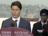 Image shows Defence Minister Harjit Sajjan with Prime Minister Justin Trudeau in Vancouver on Wednesday. (Photo courtesy Globa News)