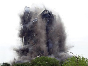 Martin Tower, former world headquarters of Bethlehem Steel, implodes Sunday May 19, 2019 in Bethlehem, Pa. Crowds gathered to watch the demolition of the area's tallest building, a 21-story monolith that opened at the height of Bethlehem Steel's power and profitability but had stood vacant for a dozen years after America's second-largest steelmaker went out of business.