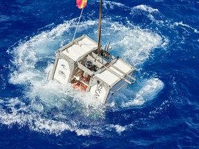 Vescovo's submarine DSV Limiting Factor, begins its descent into the waters of the Mariana Trench.