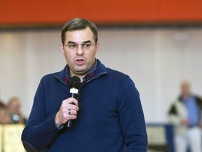 FILE - In this Thursday, Feb. 23, 2017 file photo, U.S Rep. Justin Amash, R-Cascade Township, speaks to the audience during a town hall meeting at the Full Blast Recreation Center in Battle Creek, Mich. Amash, a Republican congressman from Michigan says he's concluded that President Donald Trump has "engaged in impeachable conduct." Congressman Justin Amash tweeted Saturday, May 18, 2019 that he has read the entire redacted version of special counsel Robert Mueller's Russia report.