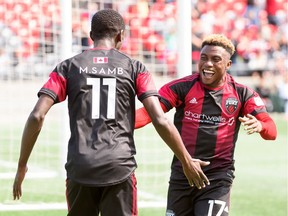 Mour Samb and Christiano François celebrate during a USL match between the Ottawa Fury FC and Charlotte Independence at TD Place Stadium on Sunday, June 2, 2019.