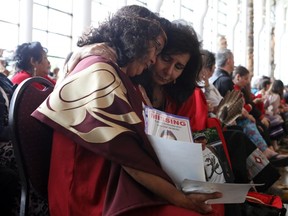 Women embrace during the closing ceremony of the National Inquiry into Missing and Murdered Indigenous Women and Girls in Gatineau, Quebec, Canada, June 3, 2019.
