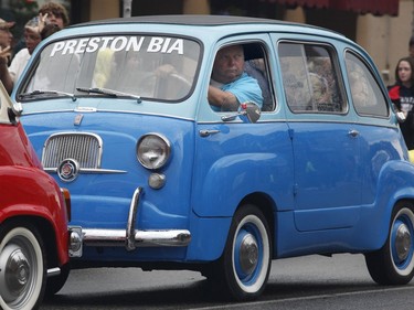 Stewart Wilkinson and his '59 Fiat 600 Multipla take part in the Italian car parade as part of the Italian Festival on Saturday.