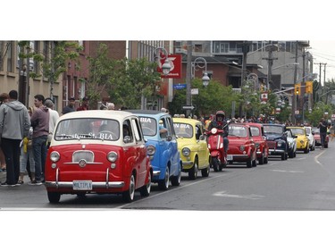 Car owners take part in the Italian car parade as part of the Italian Festival on Saturday.