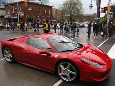 Car owners take part in the Italian car parade as part of the Italian Festival on Saturday.