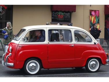 Car owners take part in the Italian car parade as part of the Italian Festival on Saturday.