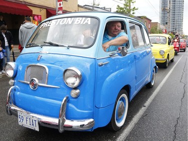 Stewart Wilkinson and his '59 Fiat 600 Multipla take part in the Italian car parade as part of the Italian Festival on Saturday.