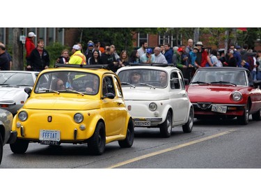 Car owners take part in the Italian car parade as part of the Italian Festival on Saturday.