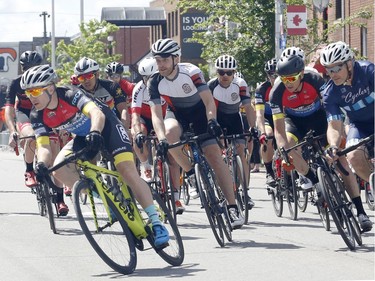 Cyclists take part in The Preston Street Criterium bike race as part of the Ottawa Italian Festival on Sunday, June 16, 2019.