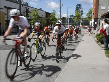 Cyclists take part in The Preston Street Criterium bike race as part of the Ottawa Italian Festival on Sunday, June 16, 2019.  (Patrick Doyle)  ORG XMIT: 0617 criterium 05
