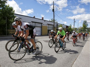 Cyclists take part in The Preston Street Criterium bike race as part of the Ottawa Italian Festival on Sunday, June 16, 2019.  (Patrick Doyle)  ORG XMIT: 0617 criterium 06
