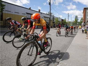 Cyclists take part in The Preston Street Criterium bike race as part of the Ottawa Italian Festival on Sunday, June 16, 2019.  (Patrick Doyle)  ORG XMIT: 0617 criterium 07