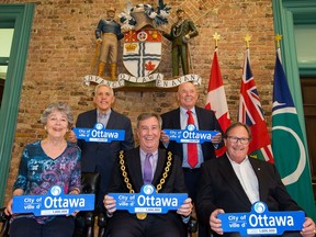 To celebrate the City of Ottawa reaching the one million population milestone, Mayor Jim Watson (centre) hosted (from left) former Ottawa mayors Jackie Holzman, Bob Chiarelli, Larry O'Brien and Jim Durrell for a luncheon Friday.