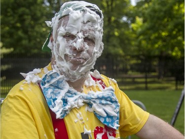 It's all in a day's work for Tom Clownsy at the annual CHEO Teddy Bear picnic at Rideau Hall on Saturday.