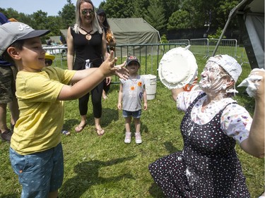 Five-year-old Mathis Ethier-Rochon watches as his pie sails towards its intended target at the annual CHEO Teddy Bear picnic.