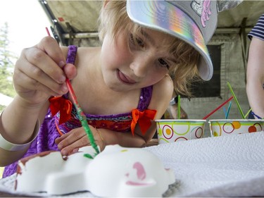 Sophie Della Zazzera puts Rembrandt on notice as she works on a teddy bear at the annual CHEO Teddy Bear picnic at Rideau Hall.