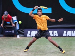 Felix Auger-Aliassime of Canada plays the ball back to Matteo Berrettini of Italy during Sunday's final at Stuttgart, Germany.