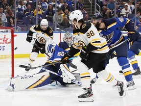 David Pastrnak of the Boston Bruins scores a second-period goal on Jordan Binnington of the St. Louis Blues in Game 3 of the 2019 NHL Stanley Cup final at Enterprise Center on June 01, 2019 in St Louis.