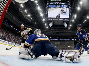David Pastrnak of the Bruins scores a third-period goal against Jordan Binnington of the Blues in Game 6 on Sunday night.
