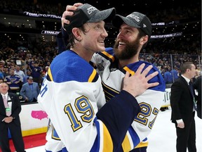 Jay Bouwmeester, left, and Alex Pietrangelo of the St. Louis Blues celebrate after defeating the Boston Bruins in Game 7 of the 2019 NHL Stanley Cup final at TD Garden on June 12, 2019 in Boston.