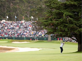 Nick Taylor of Canada plays a second shot on the 18th hole during Sunday's final round of the 2019 U.S. Open at Pebble Beach Golf Links.