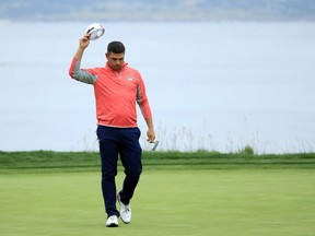 Gary Woodland celebrates on the 18th green after winning the 2019 U.S. Open at Pebble Beach Golf Links on Sunday.