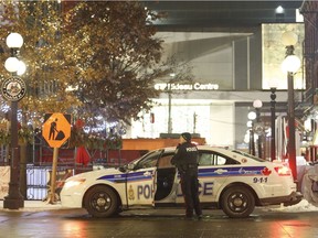 Police on the scene of a shooting near the Rideau Centre in Ottawa on Sunday, December 23, 2018.