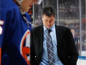 Jack Capuano leaves the ice following an Islanders game against the Red Wings on Nov. 29, 2013.