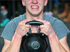 A man takes part in a national semifinal CrossFit competition in Minsk in 2015. The team behind a new study suggests the intensity of the workouts, not the exercises themselves, led to a higher rate of injury for a group of CrossFit enthusiasts.