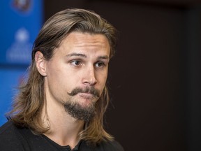 Erik Karlsson speaks to the media at Canadian Tire Centre after he was traded from the Senators to the Sharks in September.