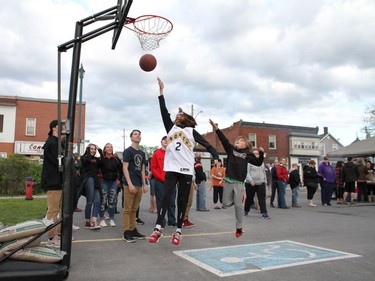 Young Raptors fans play a game of King's Court by Almonte Old Town Hall ahead of Sunday's televised game in Toronto.