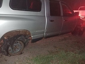 Side view of a truck with two blown-out tires. Man, 24, arrested after driving the vehicle for more than six km.