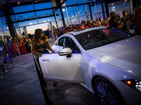 Stacey Martin Bafi-Yeboa arrived in style in a Mercedes-Benz CLS450 that drove right into the showroom before the fashion show began.