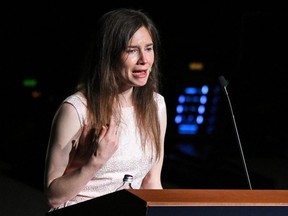 Amanda Knox, who returned to Italy for the first time since being cleared of the murder of British student Meredith Kercher, cries as she speaks at the Criminal Justice Festival in Modena, Italy, on Saturday, June 15, 2019.