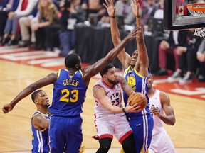 Even though Toronto guard Fred VanVleet (23) looks tiny on the floor compared with the behemoths around him, he is actually 6 feet tall.