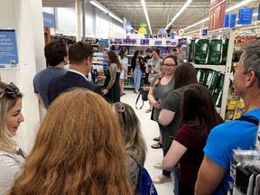Type 1 diabetes advocates from the United States wait at a Canadian pharmacy to purchase lower cost insulin in London, Ontario, Canada June 29, 2019.