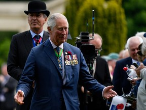 Charles, Prince of Wales arrives the Royal British Legion Service of Remembrance at the Commonwealth War Graves Cemetery on June 6, 2019 in Bayeux, France.