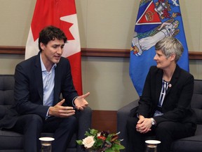 Prime Minister Justin Trudeau meets with Mayor Lisa Helps in her office at City Hall in Victoria, B.C., on Thursday, March 2, 2017. Helps says a move to seek federal funding for the city's annual Remembrance Day events may have backfired.