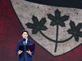 Canada's Prime Minister Justin Trudeau speaks on stage during an event to commemorate the 75th anniversary of D-Day, in Portsmouth, Britain, June 5, 2019.