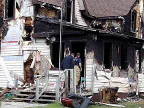 Investigators on the scene of a fatal fire in the village of Colebrook on Tuesday June 11, 2019.