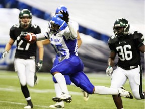 Ashton Dickson runs with the ball in 2010 at the Roger's Centre in Toronto in the Ontario Varsity Football League semifinals.