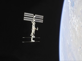 This NASA photo obtained Nov. 4, 2018 shows the International Space Station photographed by Expedition 56 crew members from a Soyuz spacecraft after undocking. (AFP PHOTO / NASA/ROSCOSMOS)