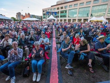 Fans applaud as singer Judith Hill opens the 39th edition of the TD Ottawa Jazzfest at Marion Dewar Plaza in front of Ottawa City Hall. Photo by Wayne Cuddington / Postmedia
