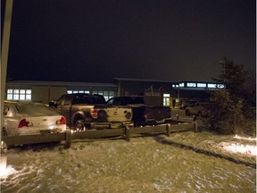RCMP vehicles were stationed at the scene on the night after a mass shooting at La Loche Community School on Jan. 22, 2016.