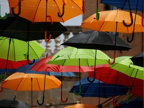 A canopy of coloured umbrellas.