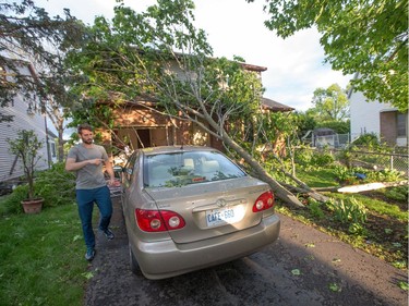 One of the homes on Singleton Way that suffered damage as a reported tornado touched down in the Orléans suburb of Ottawa on Sunday evening. Wayne Cuddington / Postmedia